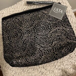 Ulta NWT Cosmetic Makeup Bag Black/Gold zipper close with Tassle
